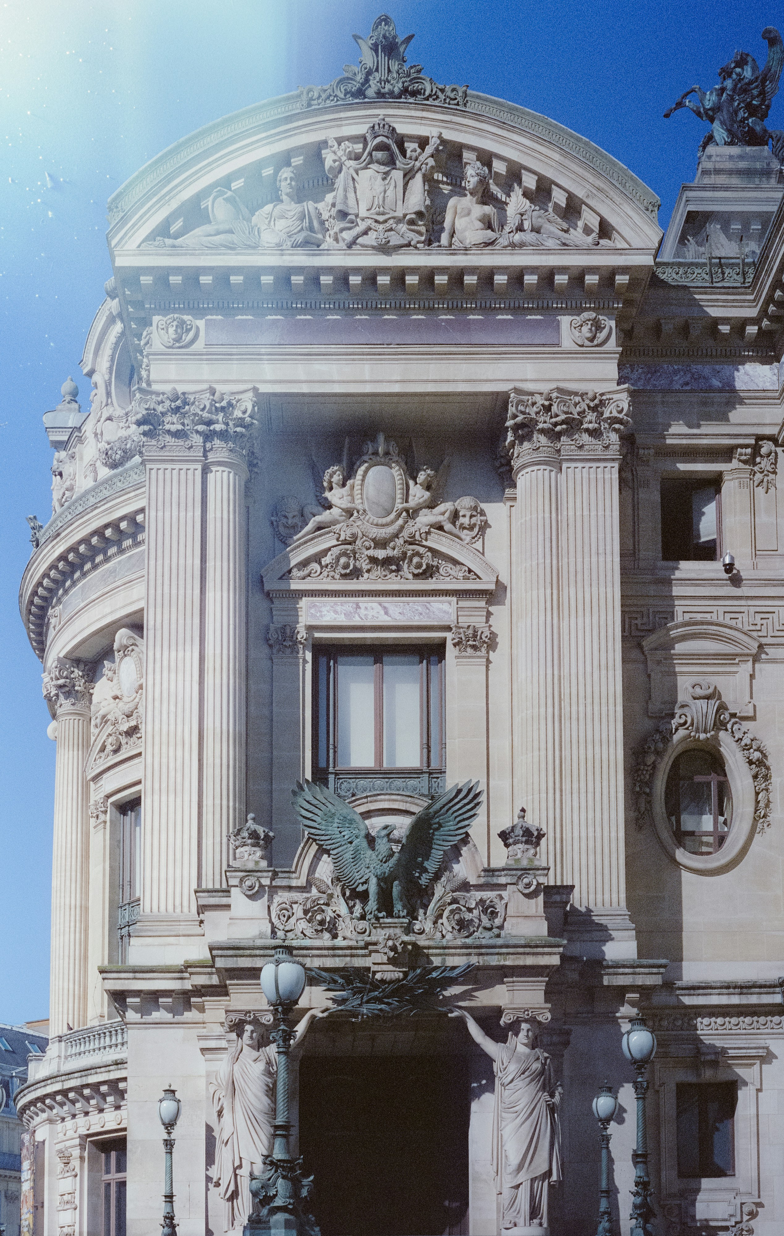 Ornate building facade with sculptures and columns