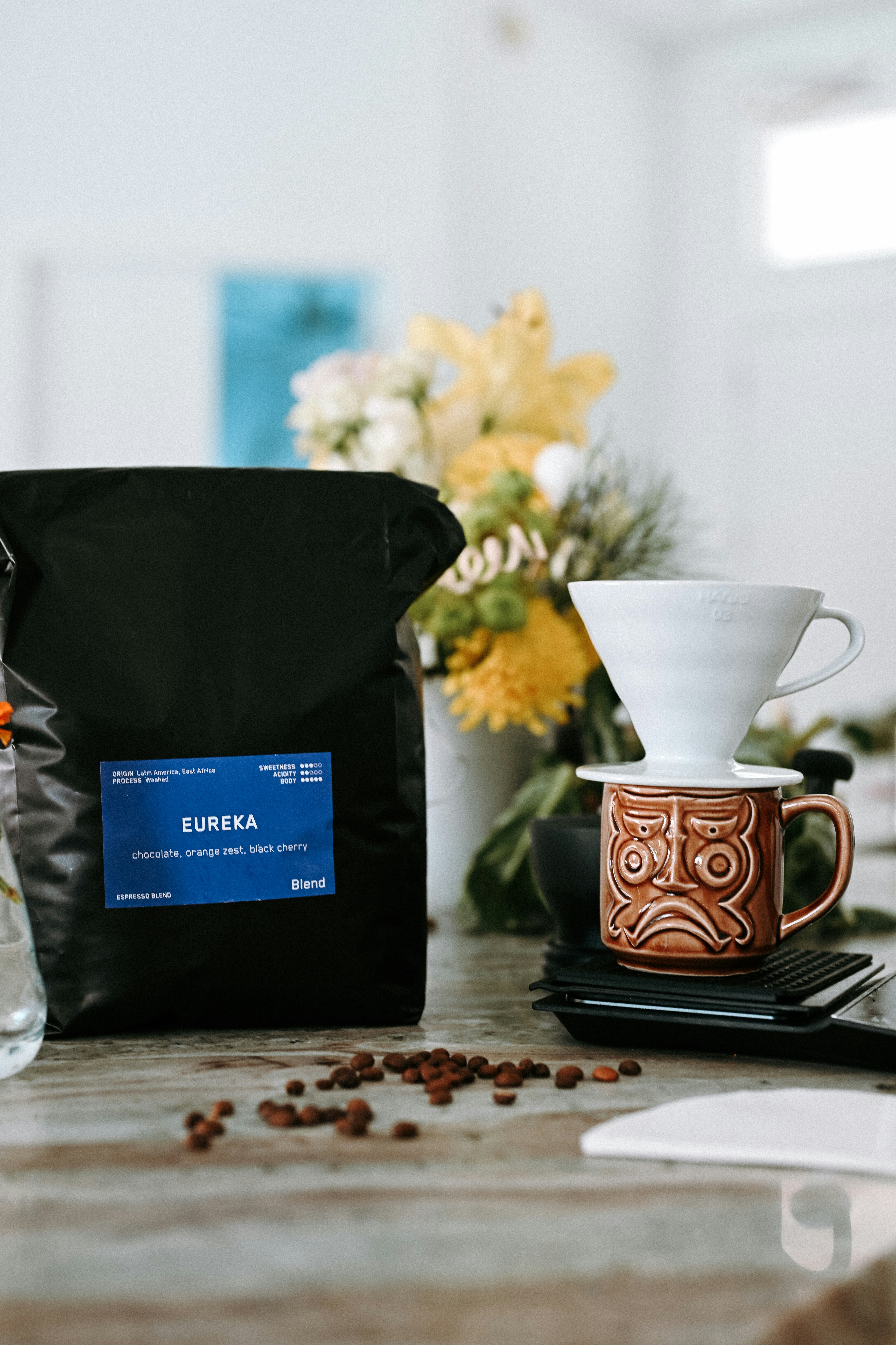 Coffee beans and brewing equipment on a table