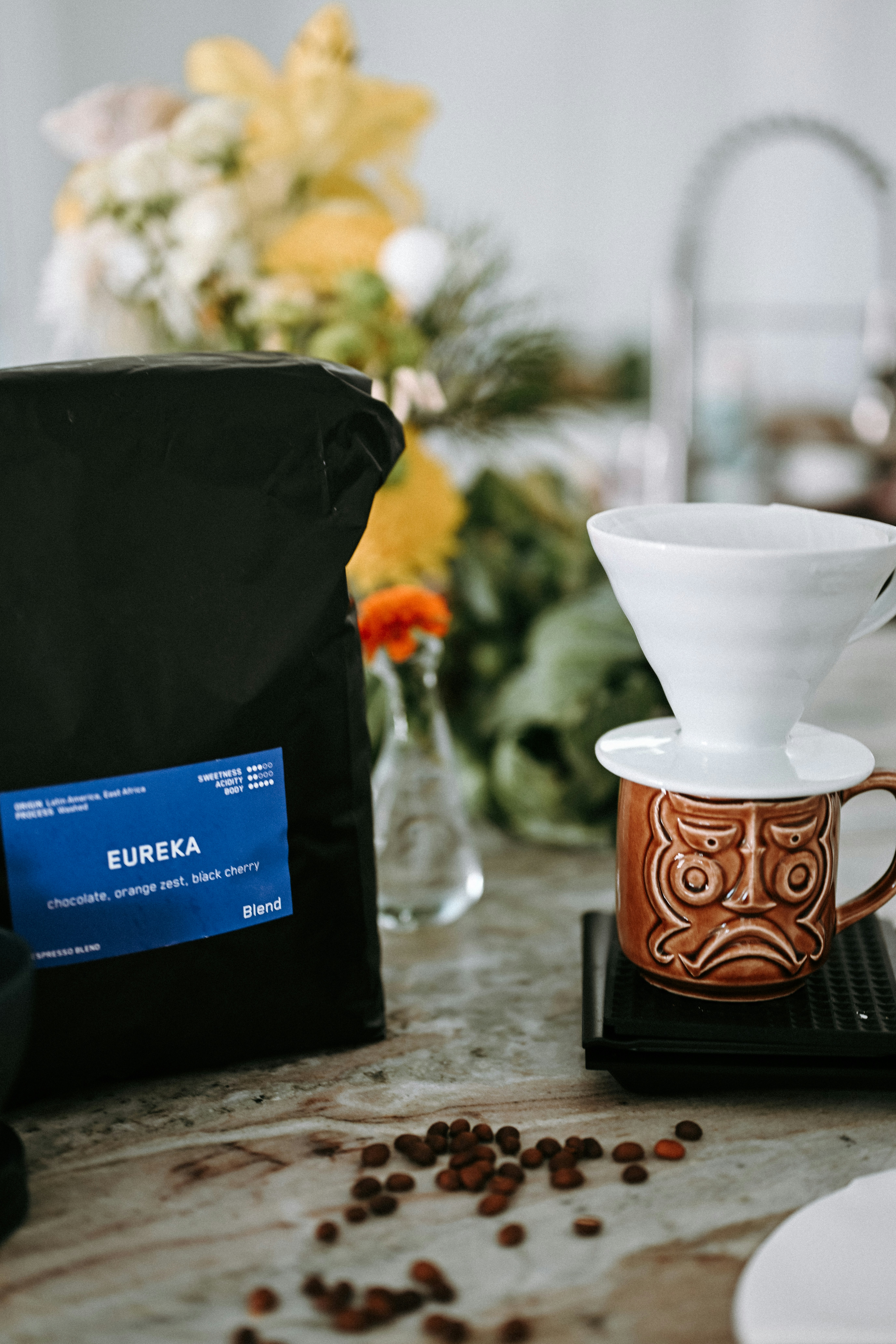 Coffee beans and brewing equipment on a counter