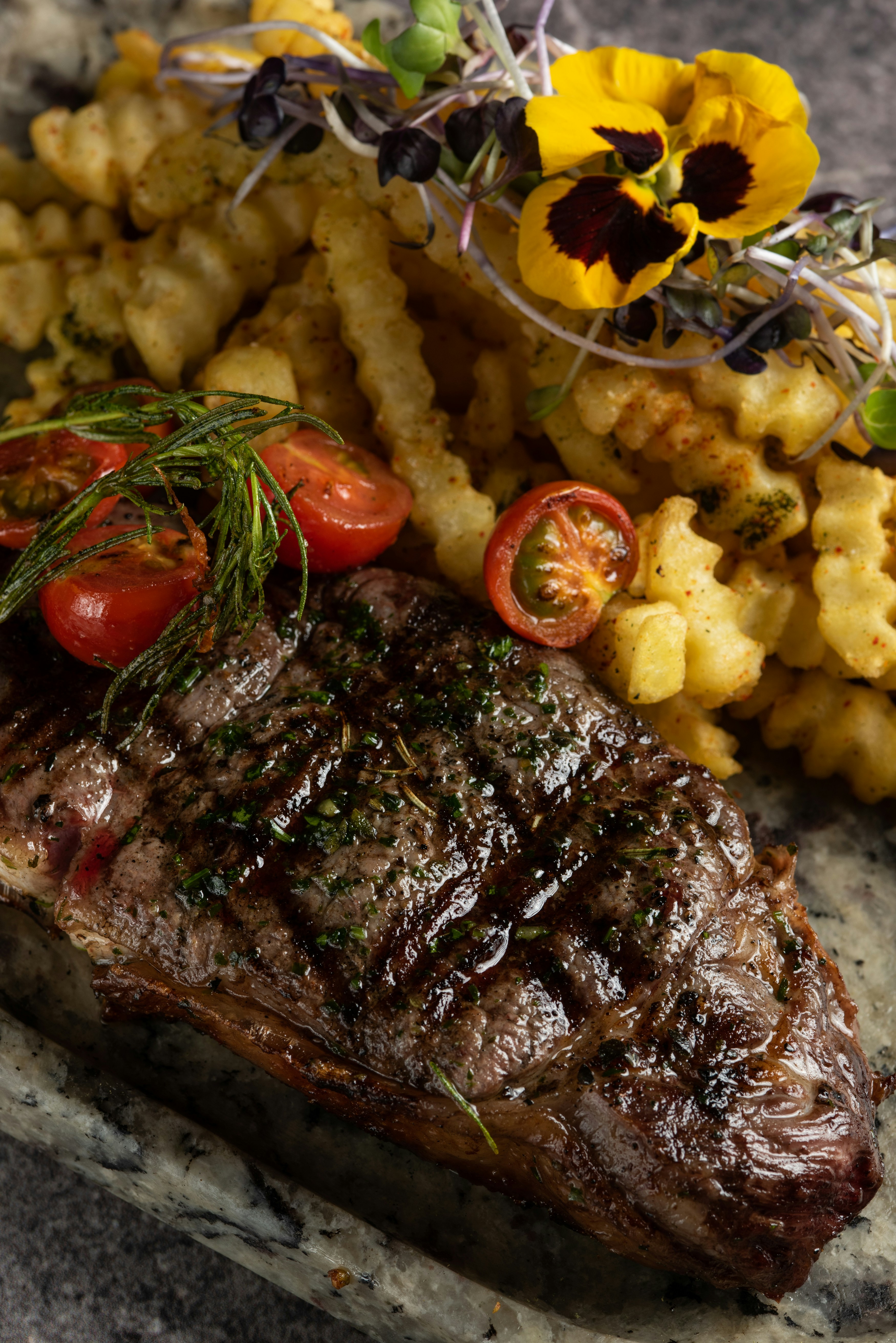 A Well-Done Steak at a Busy Midrange Restaurant