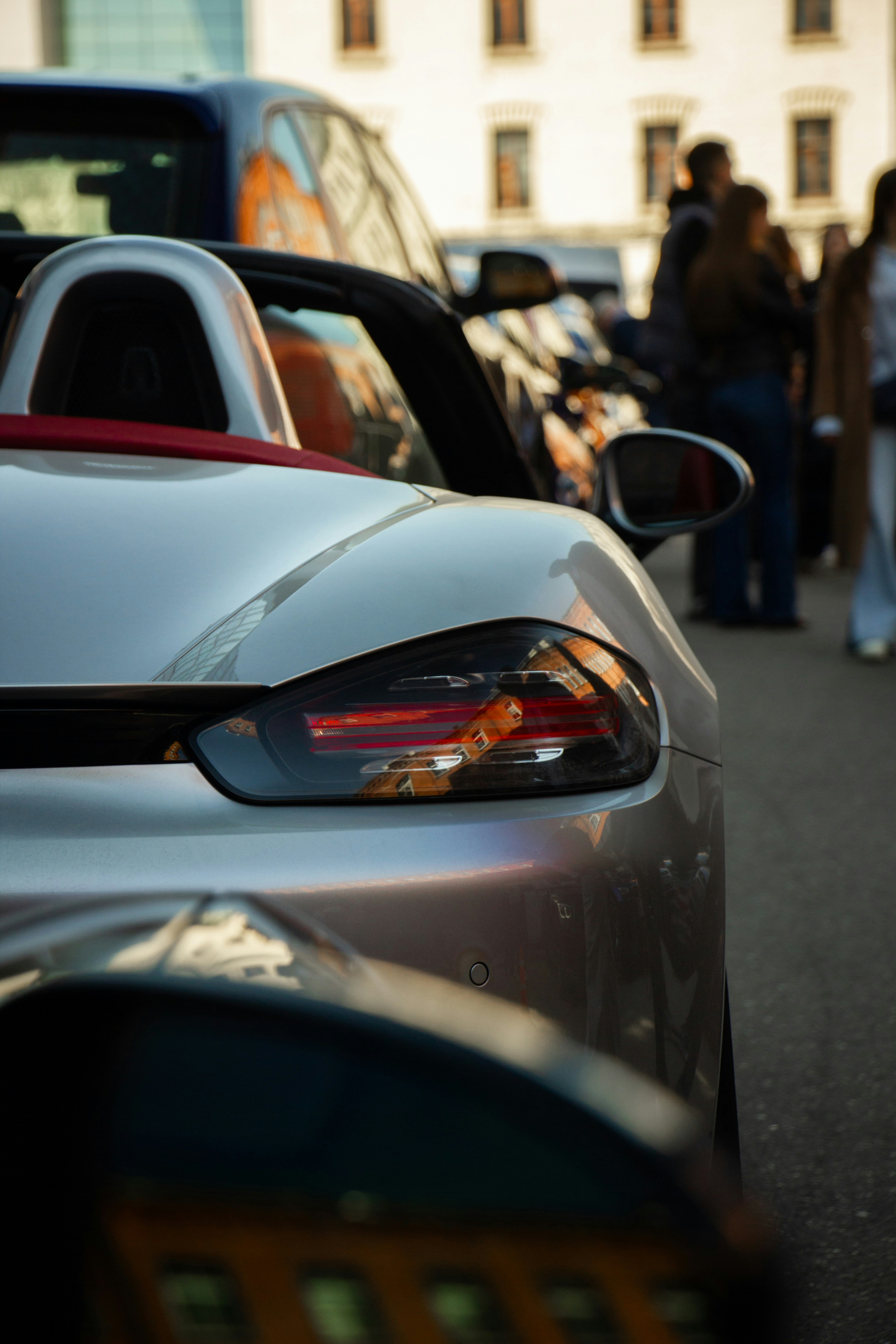 Close-up of a silver convertible sports car tail light