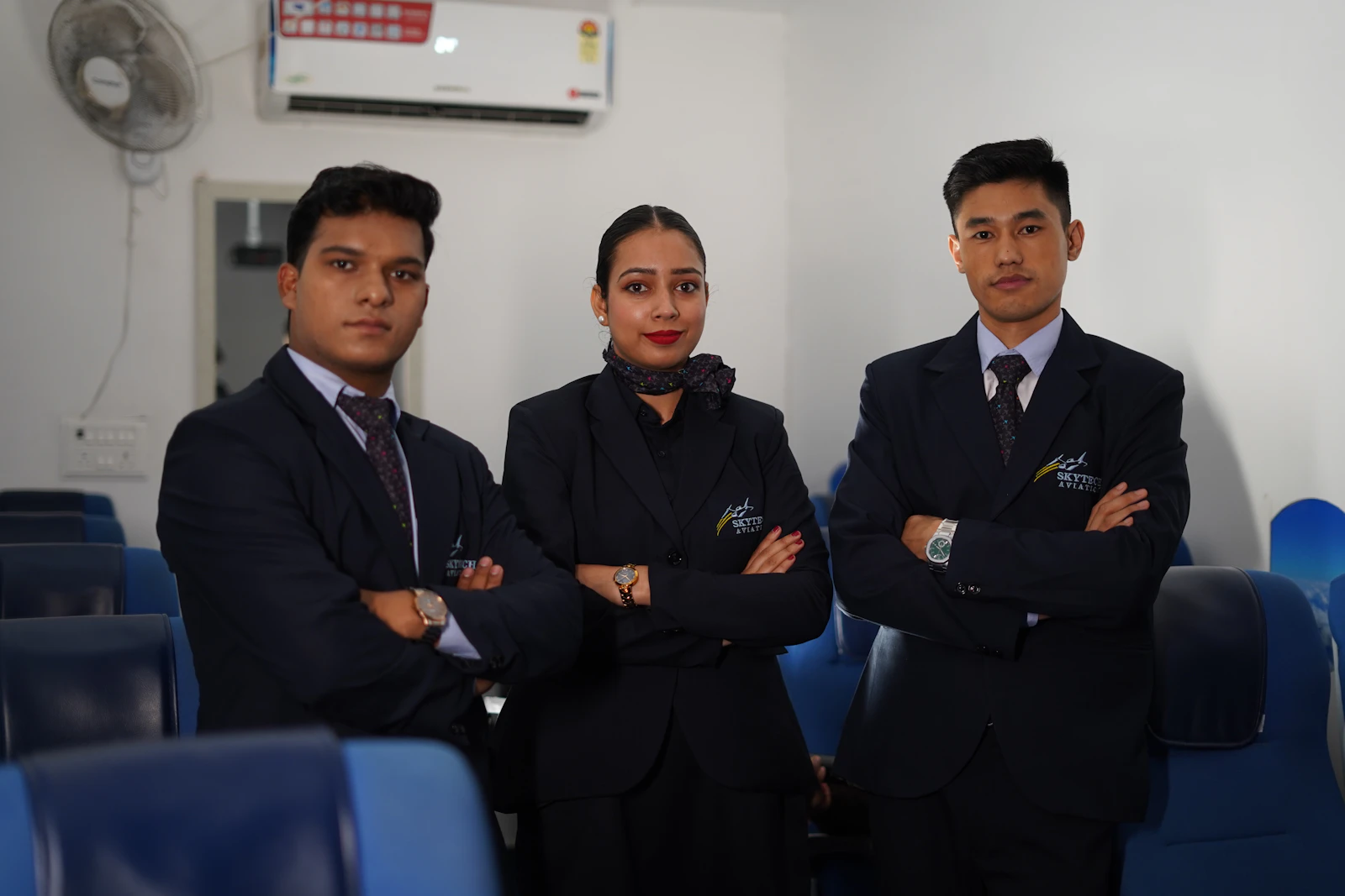 Aviation operators standing together in uniform on the apron