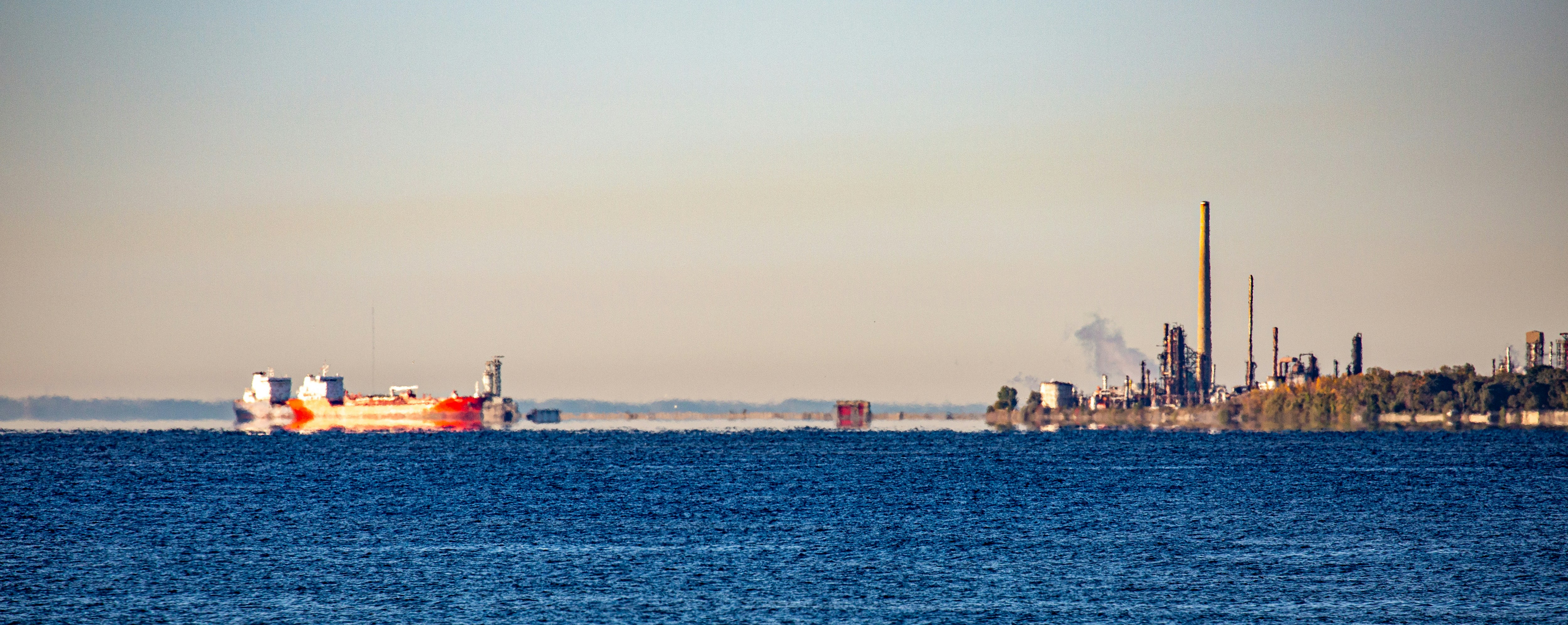 Boats and industrial structures on the water