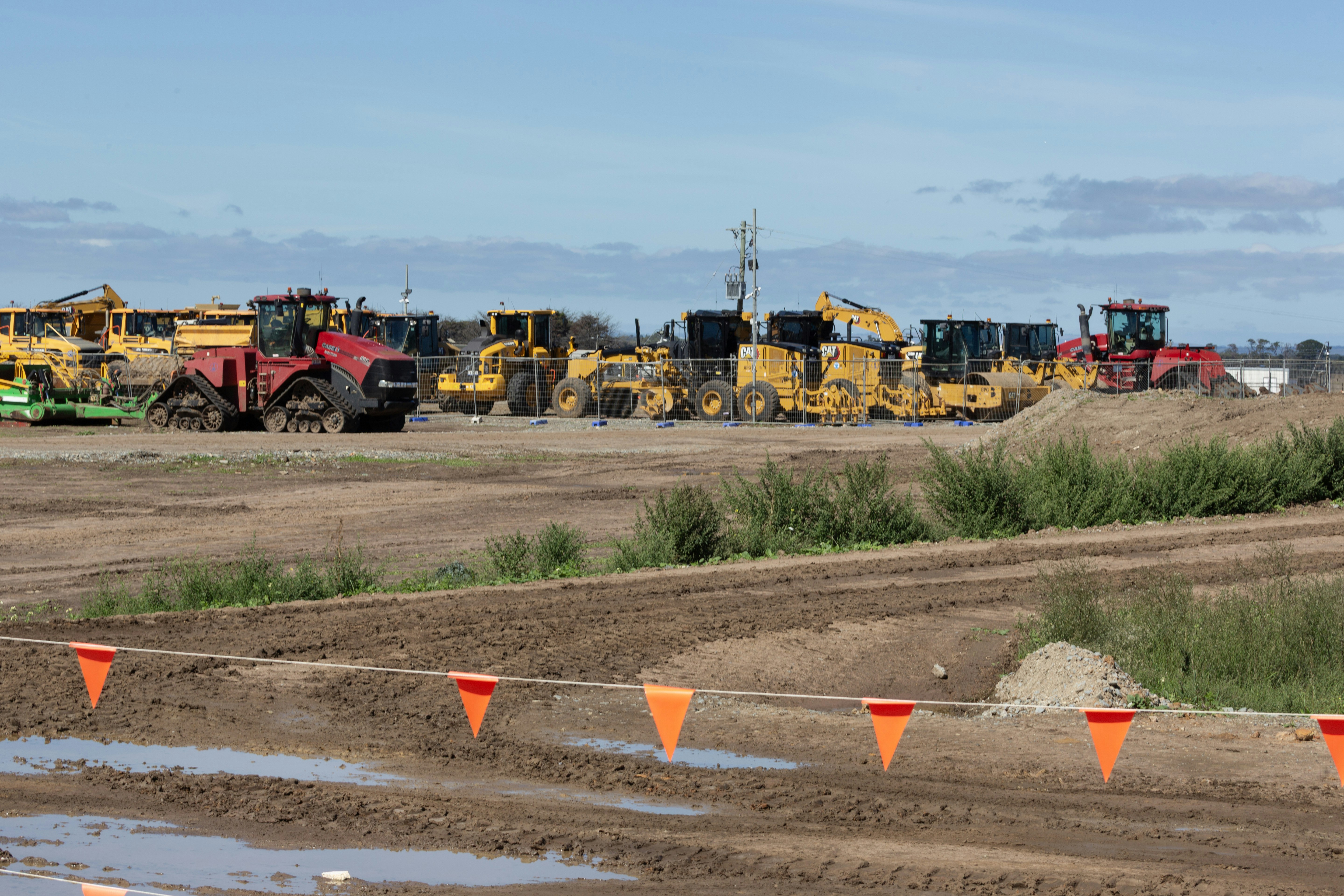 Construction equipment parked in a field