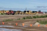 Construction equipment parked in a field
