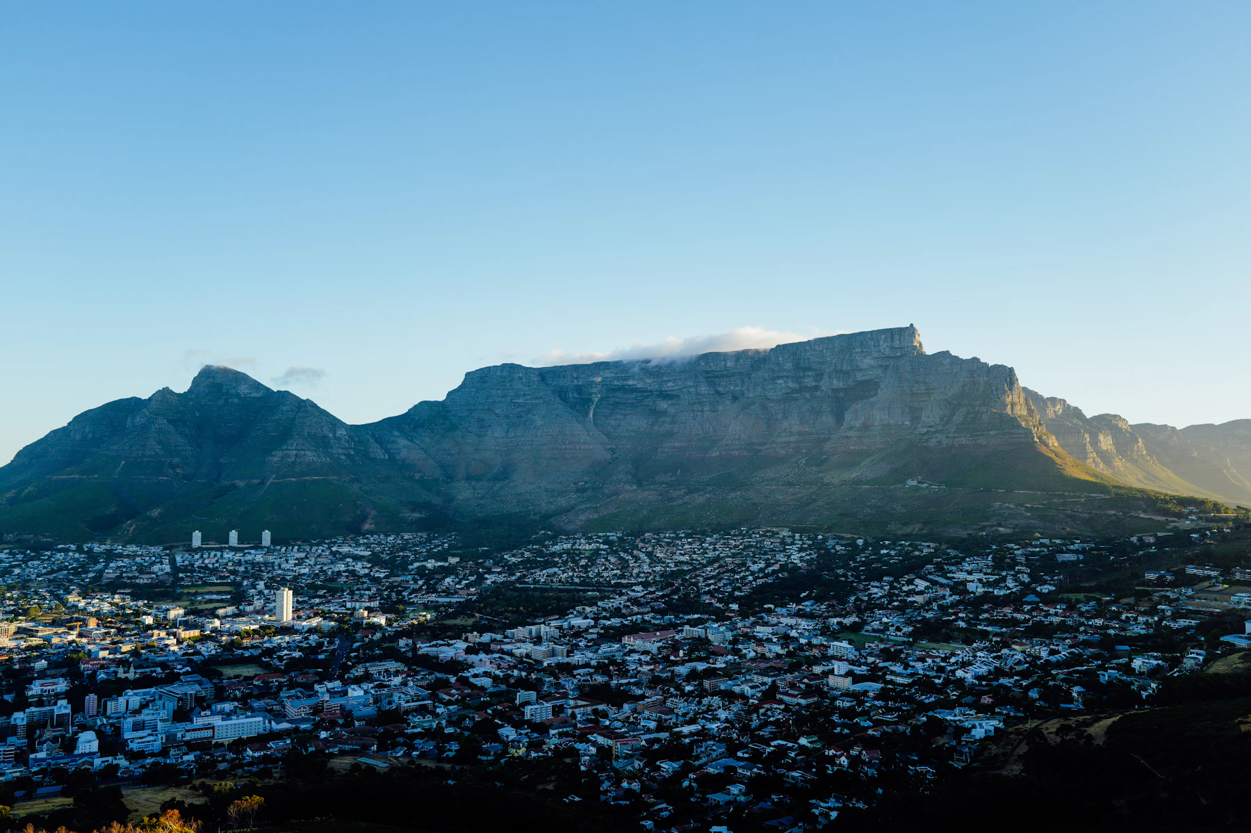 Table Mountain rising above Cape Town in the clear light of dawn