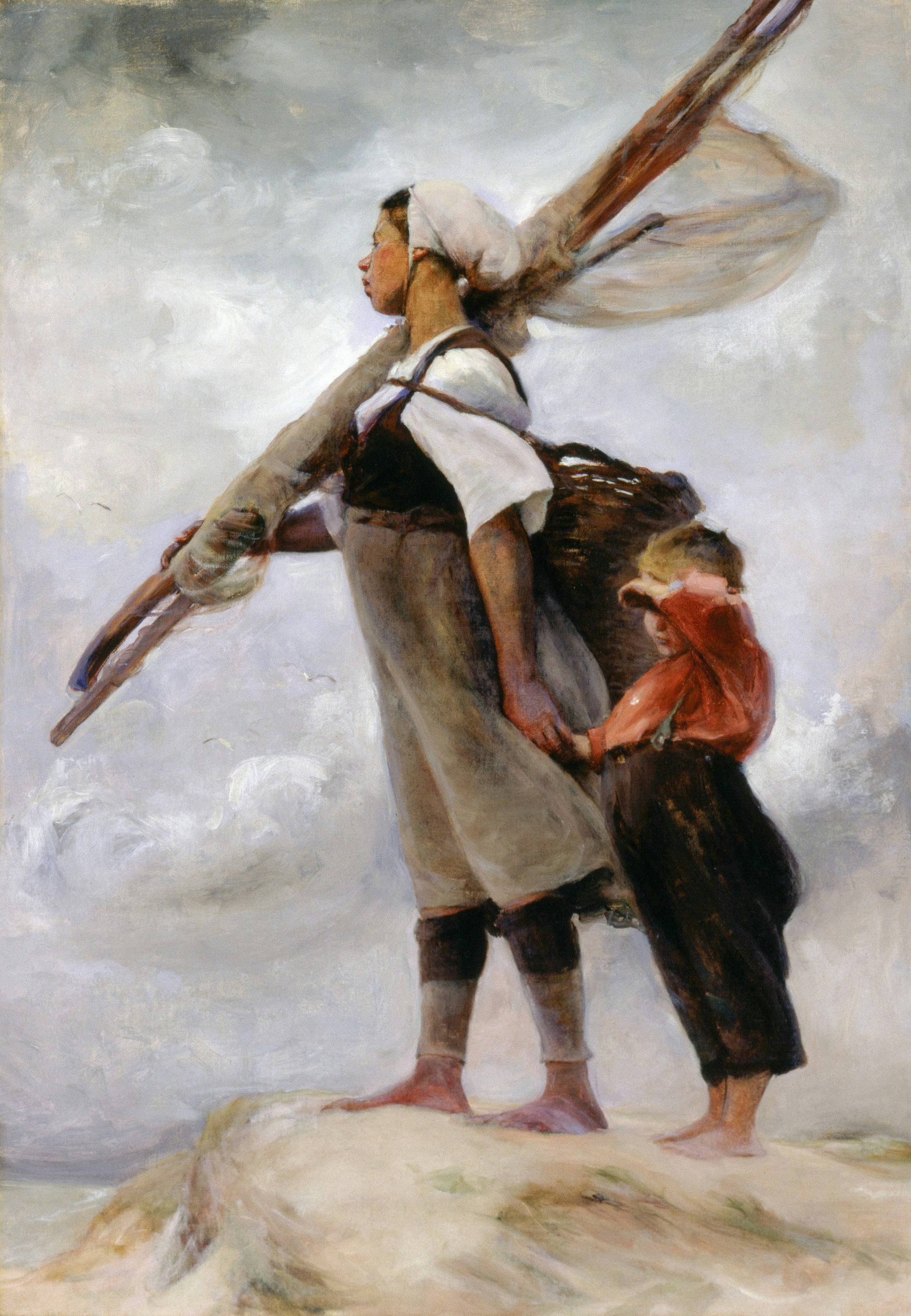 Woman and child walking on a rocky shore