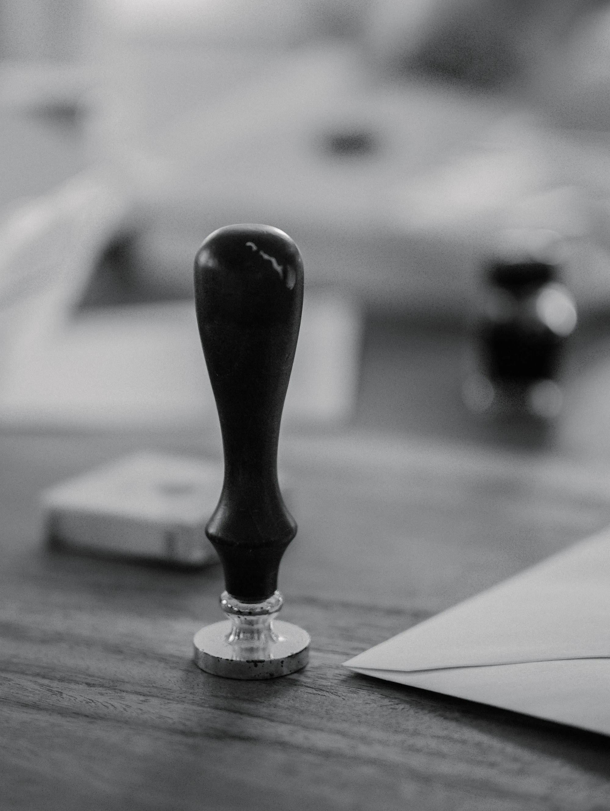 A wooden stamp on a desk