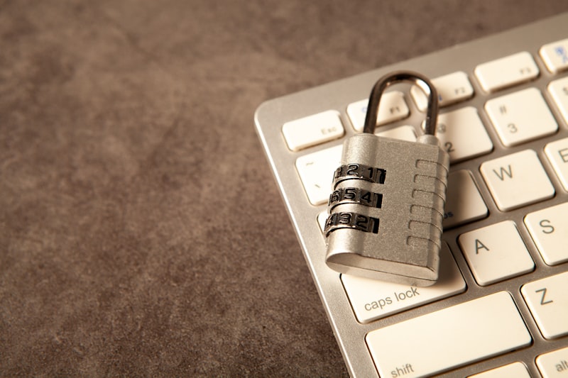 A padlock resting on a computer keyboard, representing cryptographic security