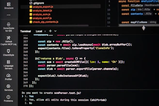 Coding on a dark theme computer screen