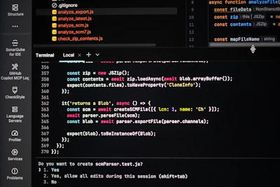 Coding on a dark theme computer screen