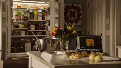 Kitchen counter with baking ingredients and mixing bowls