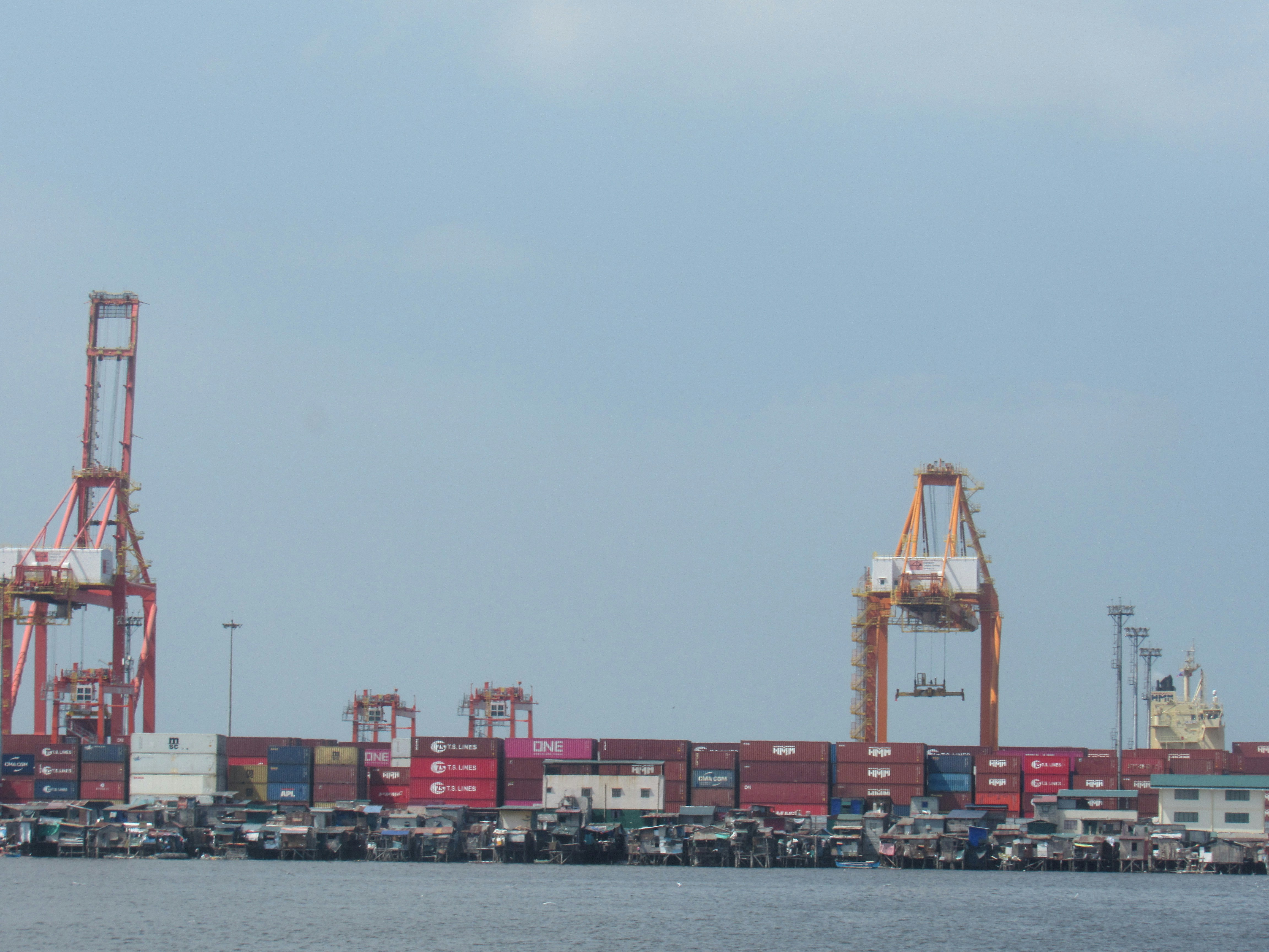 shipping containers at a port terminal preparing for transatlantic transport