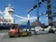 A port with a ship and cargo crane.