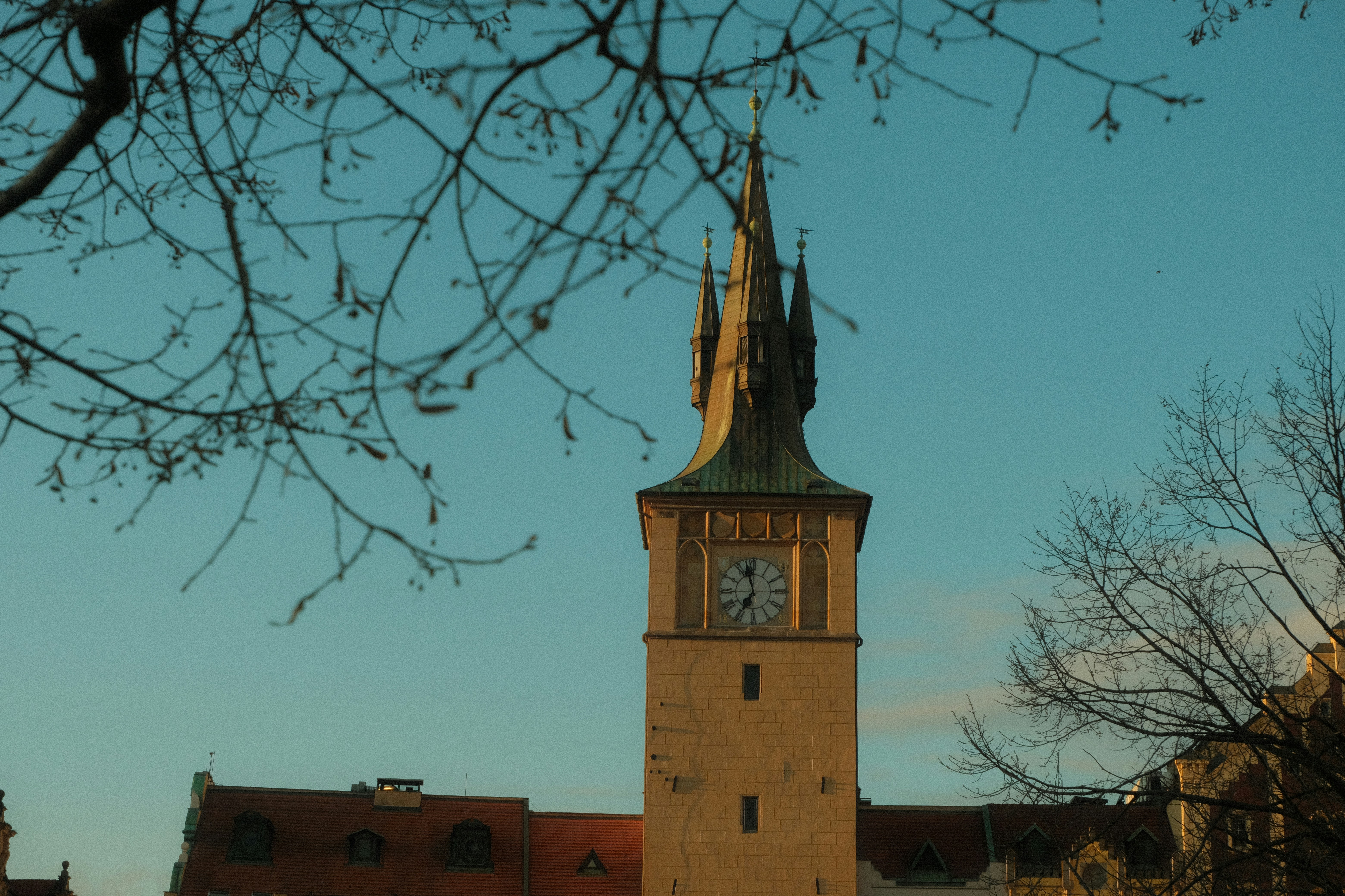 A clock tower against a clear blue sky