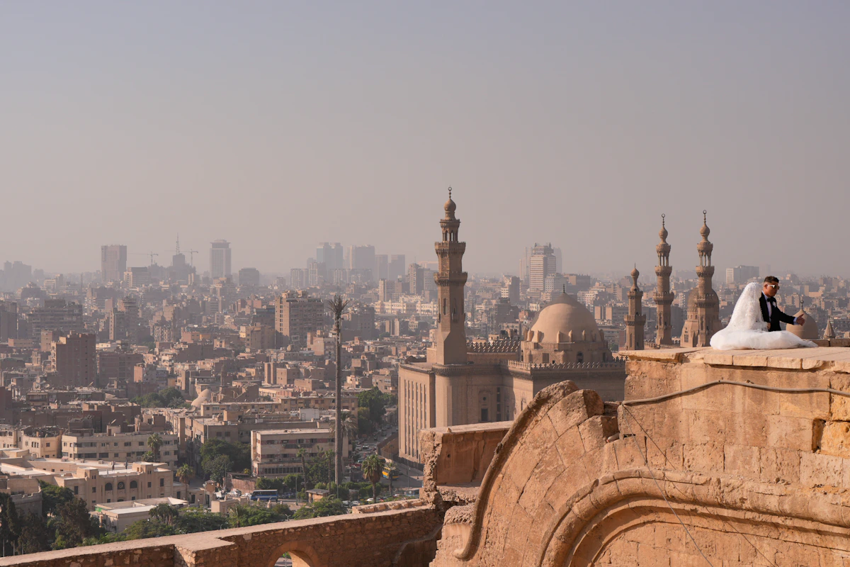 Newlyweds overlooking the historic Cairo skyline