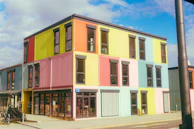 Colorful modular building with multiple windows and windows