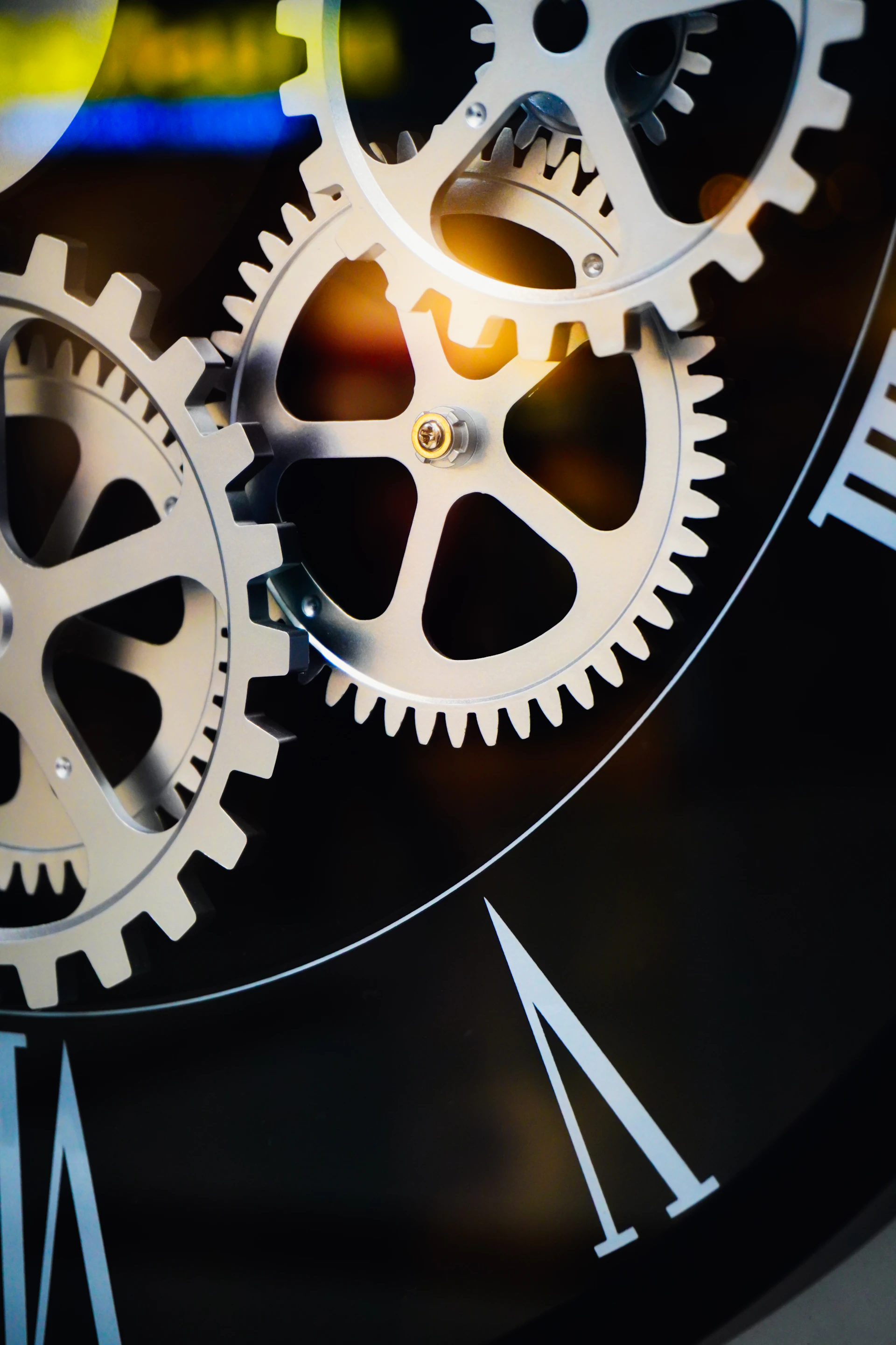 Close-up of intricate clockwork gears and roman numerals