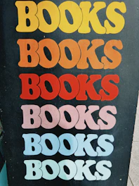 The word "books" repeated in colorful retro lettering.