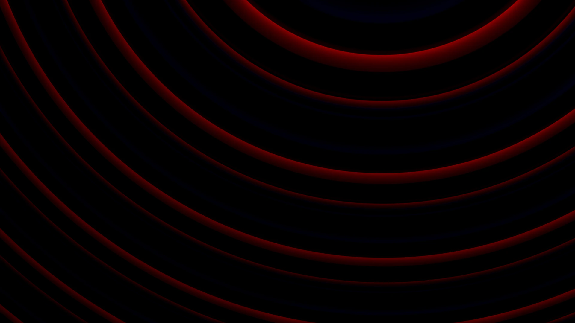 Concentric red rings on a black background
