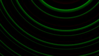 Concentric green lines on a black background