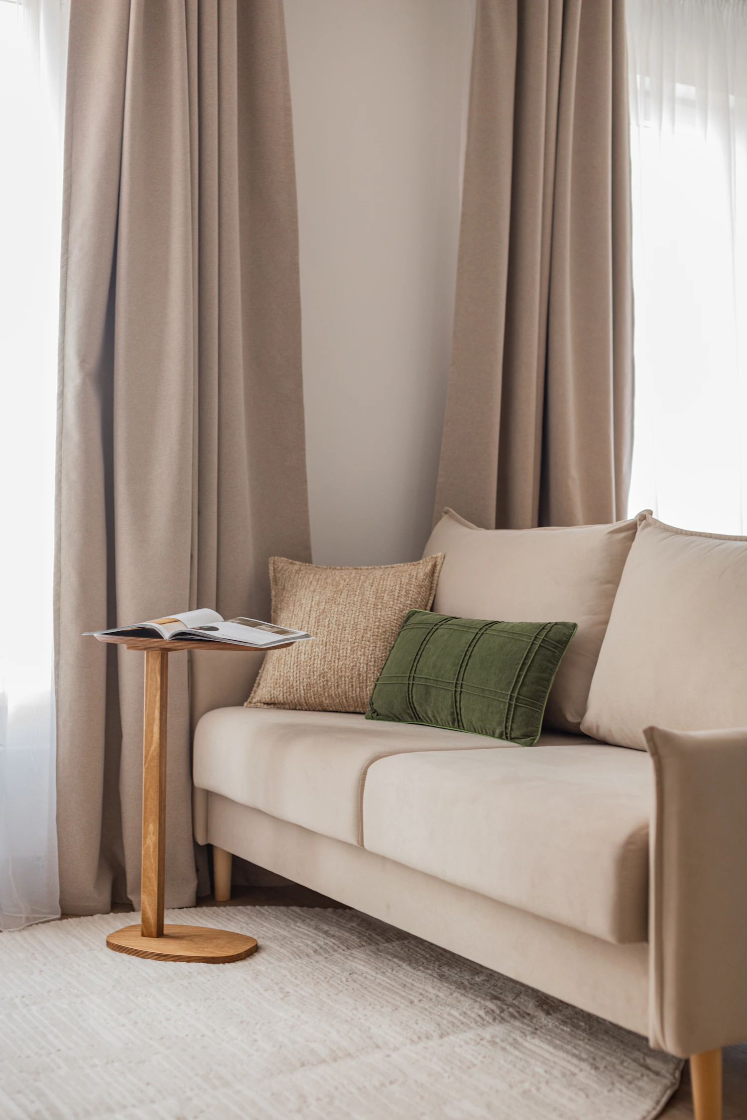 Neutral living room with sofa and side table