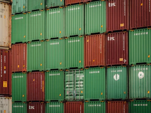 Stack of shipping containers in red and green