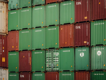 Stack of shipping containers in red and green