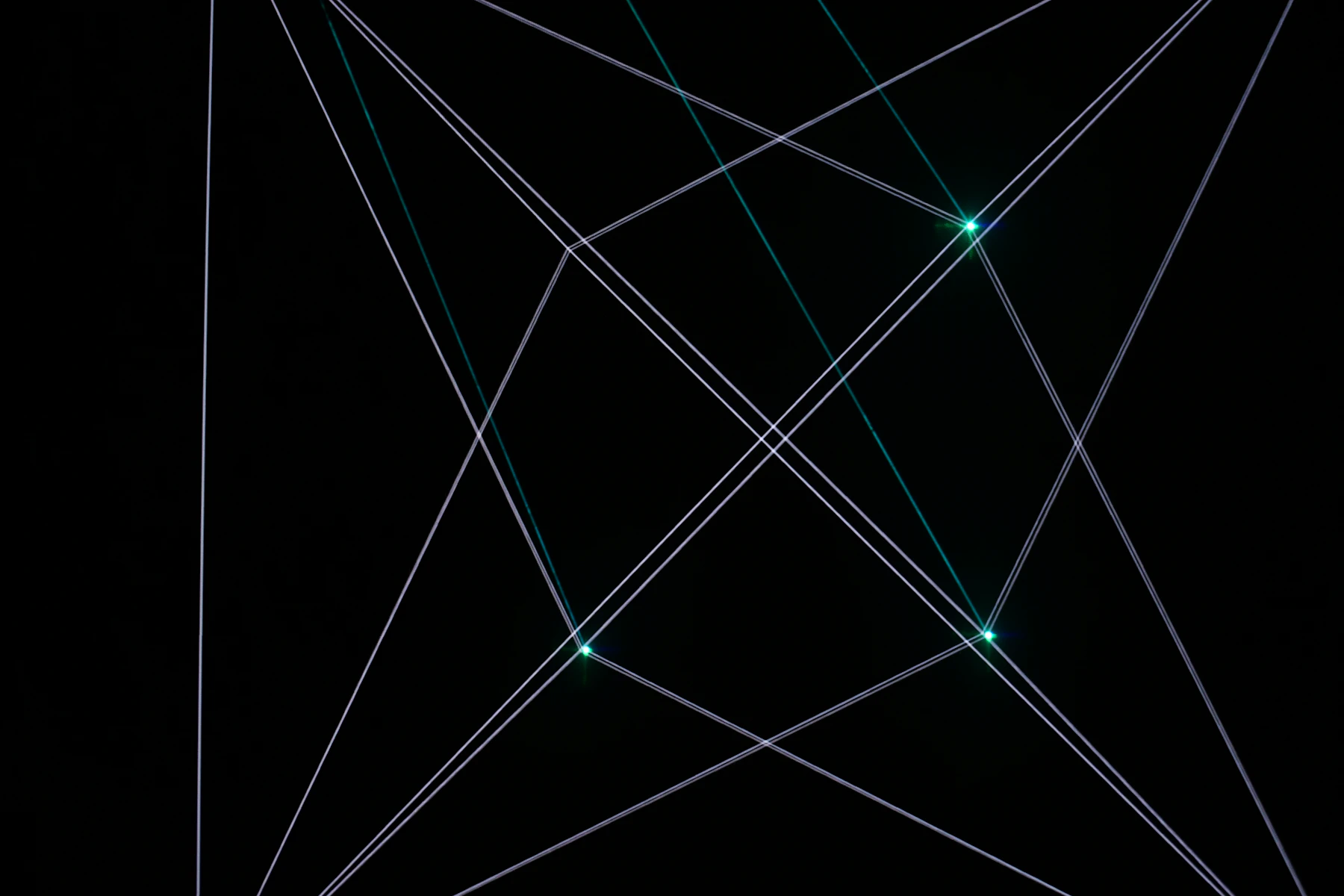 Abstract geometric light lines crossing a dark background