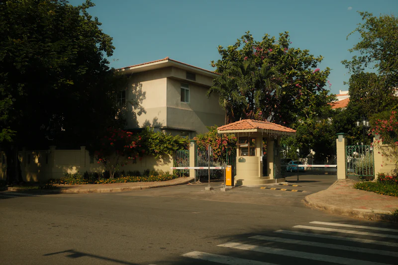 Gated community entrance with security booth