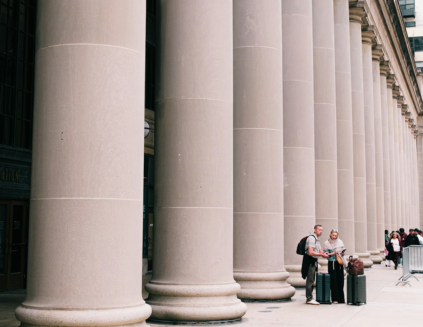 Grand stone columns of a courthouse — a symbol of justice and the law