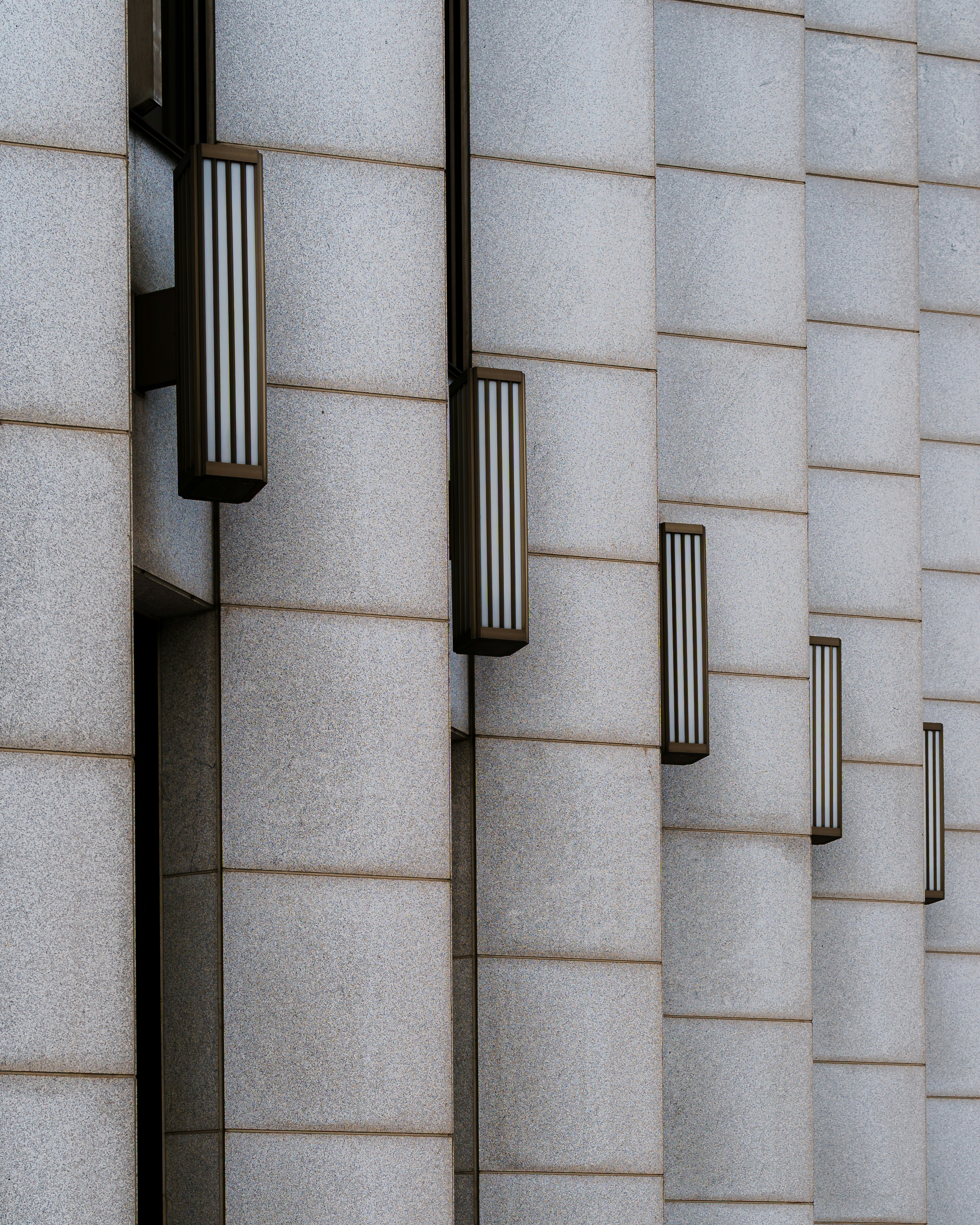 Row of lights on a modern building facade