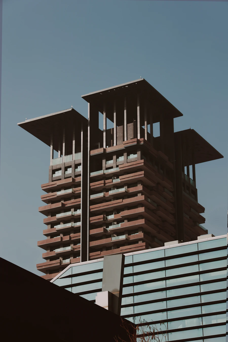 Modern twin towers — two currencies, one plan