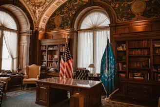 Grand office with flags and bookshelves