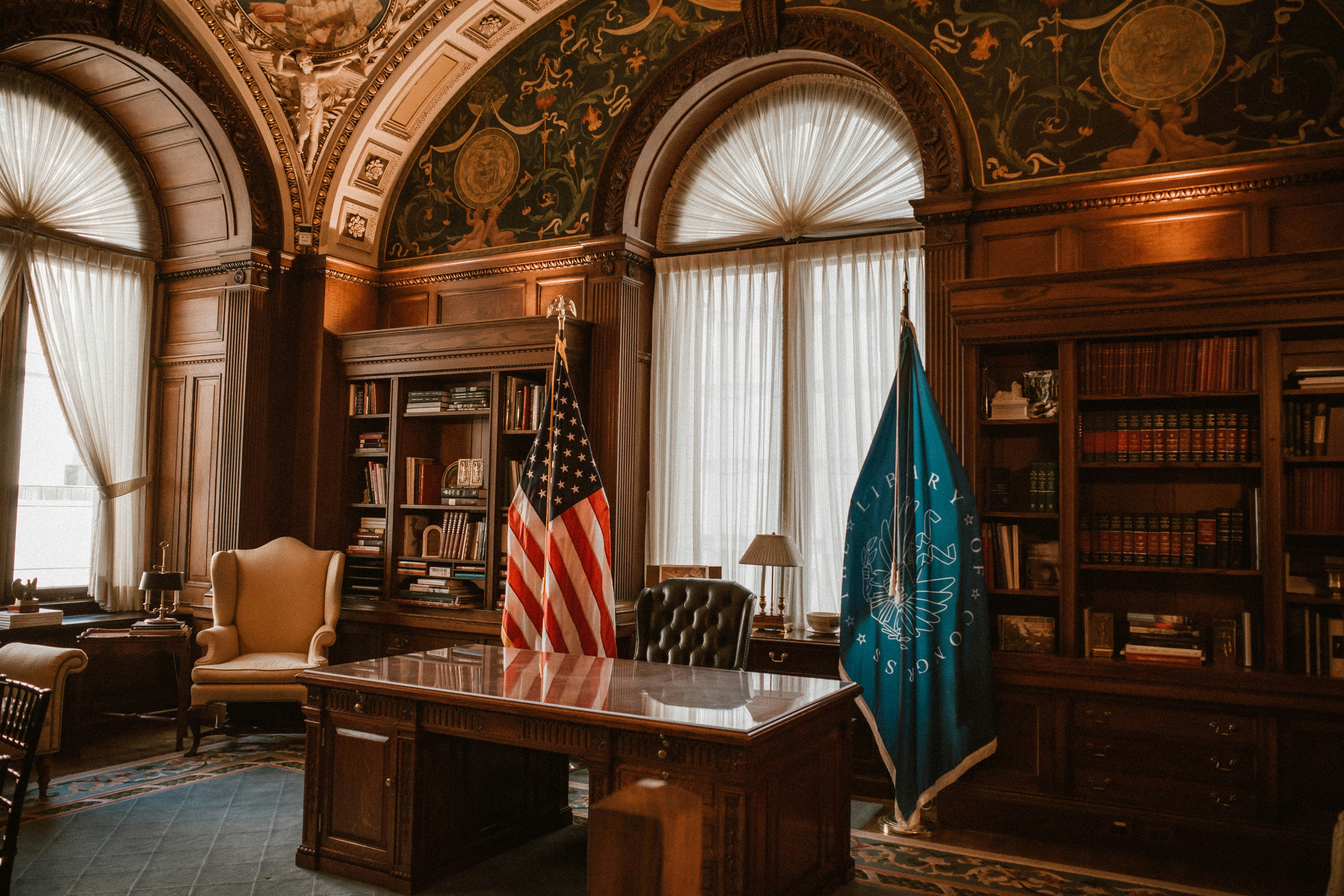 Grand office with flags and bookshelves