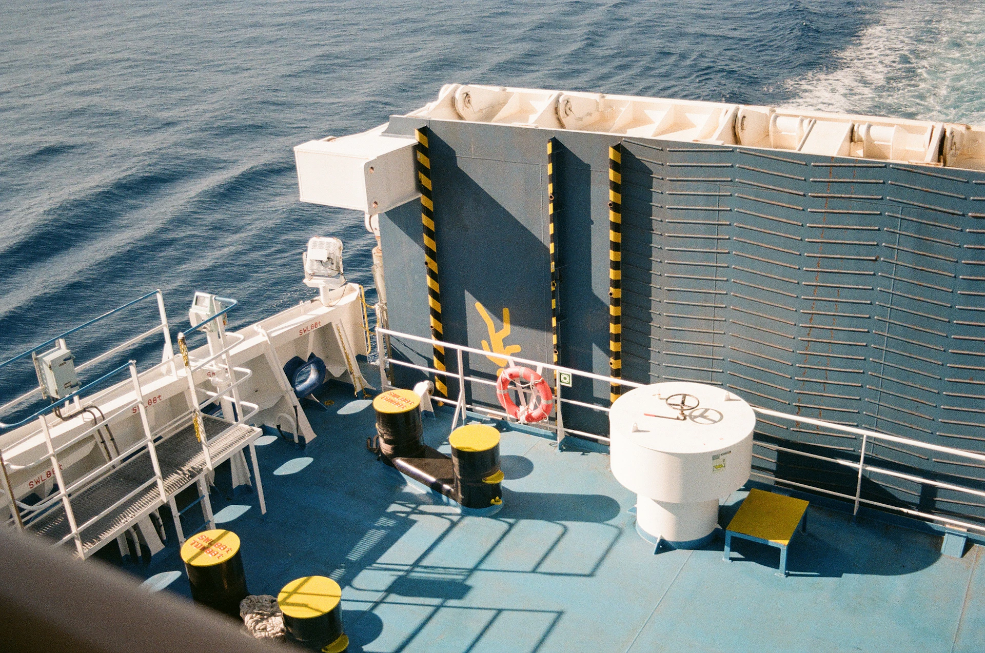 Deck of a ship sailing on the blue ocean
