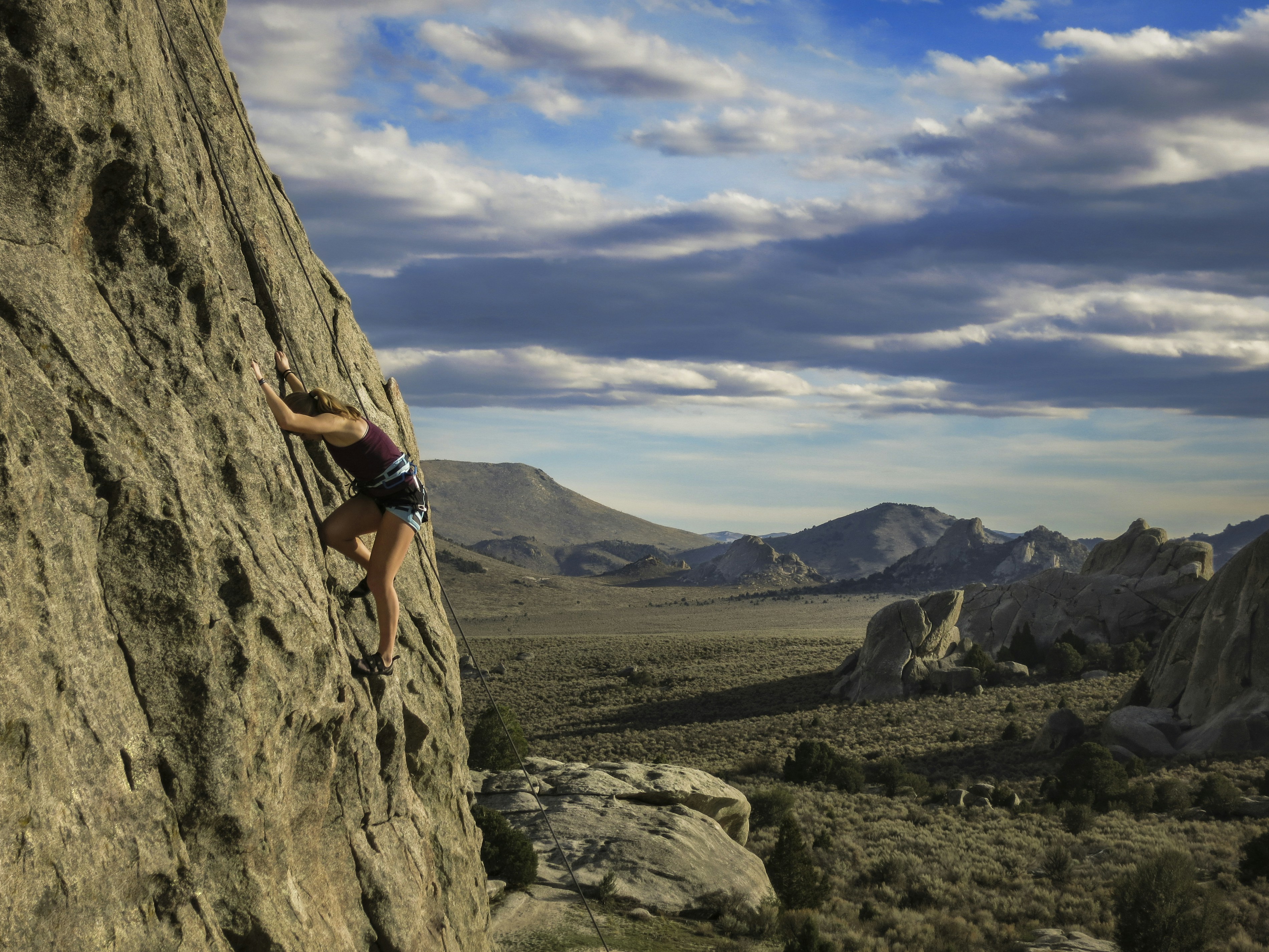 Charlize Theron Scales Rock Walls for New Netflix Film, Showcasing Elite Fitness