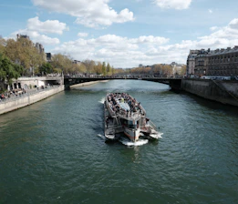 Tour boat on the seine river in paris