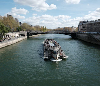 Tour boat on the seine river in paris