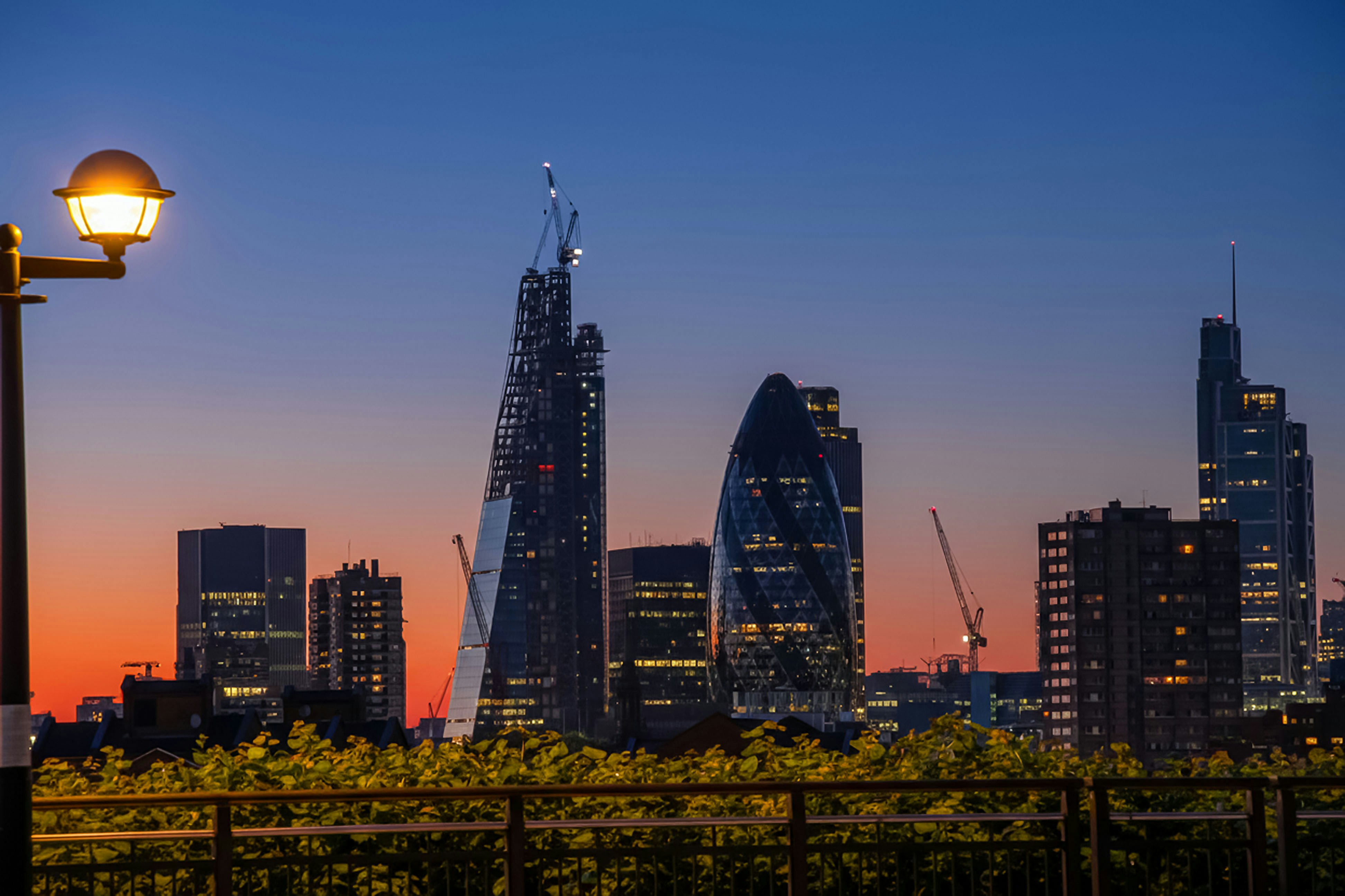City skyline with modern buildings at dusk