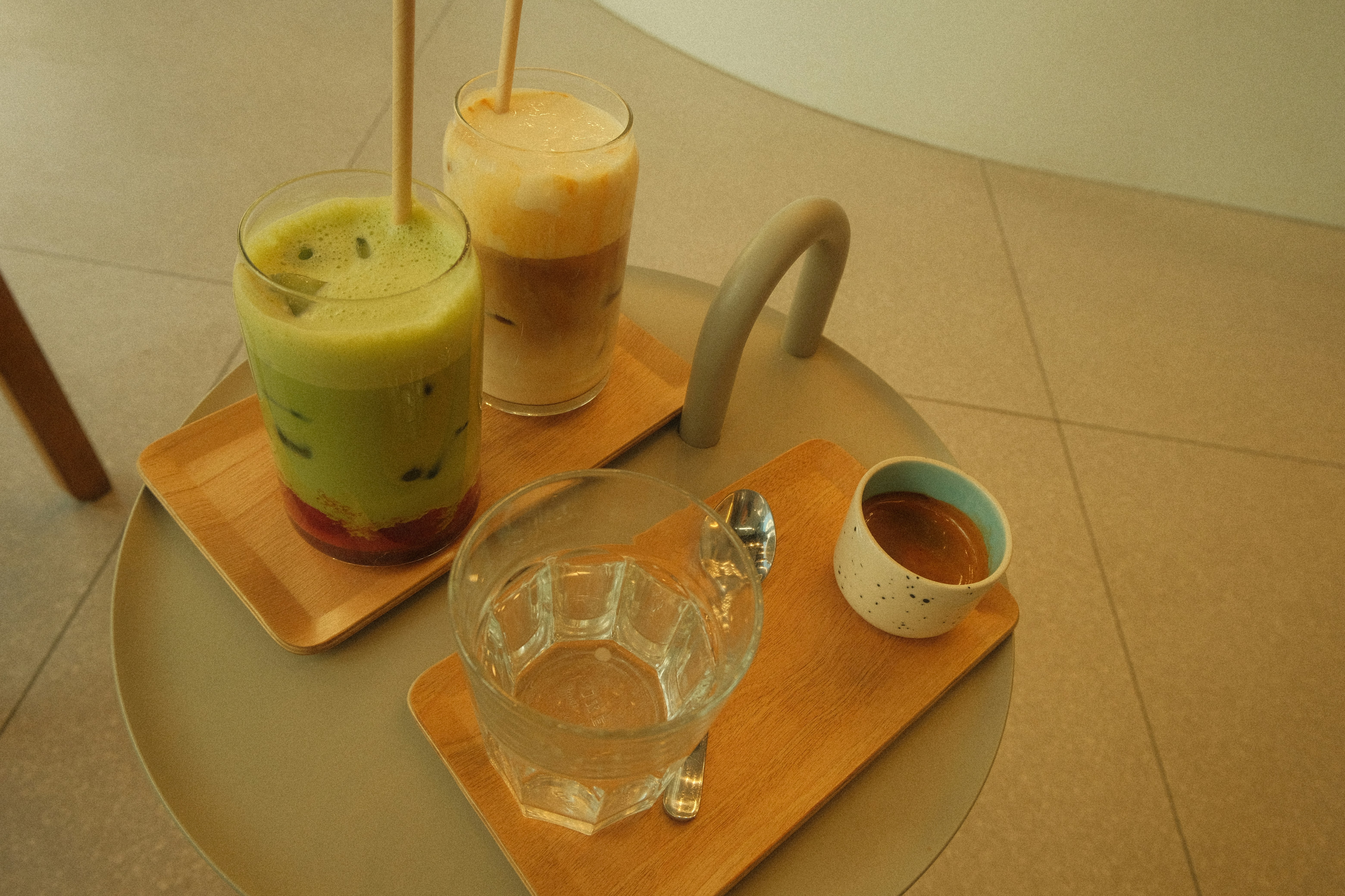 Three drinks on a small table