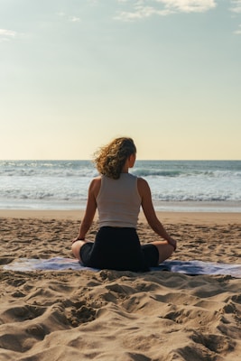 Woman meditating peacefully, representing inner awareness and self-discovery