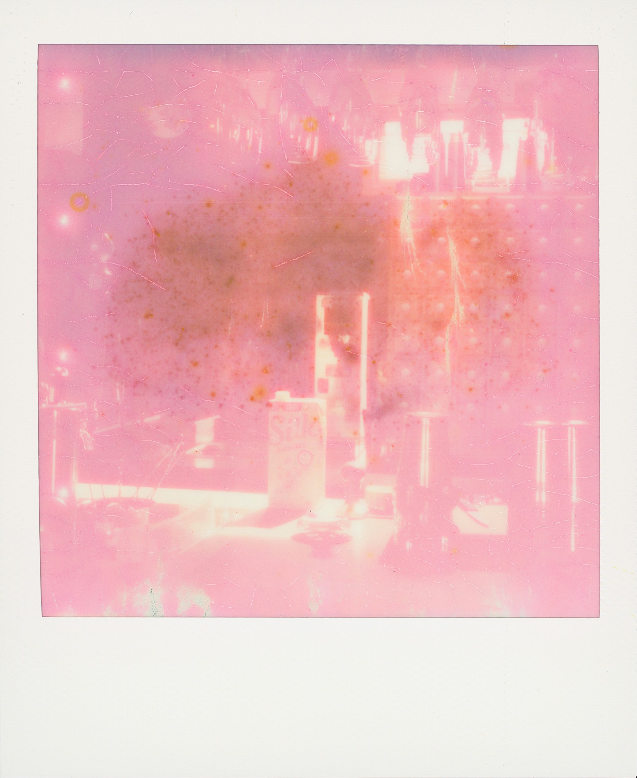 Abstract pink and orange background with blurry shapes