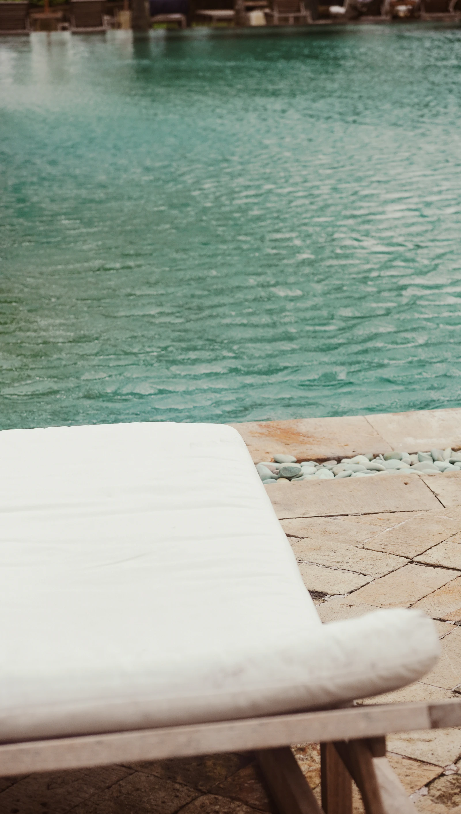 Premium hotel pool and lounge setting representing guest retention and experience