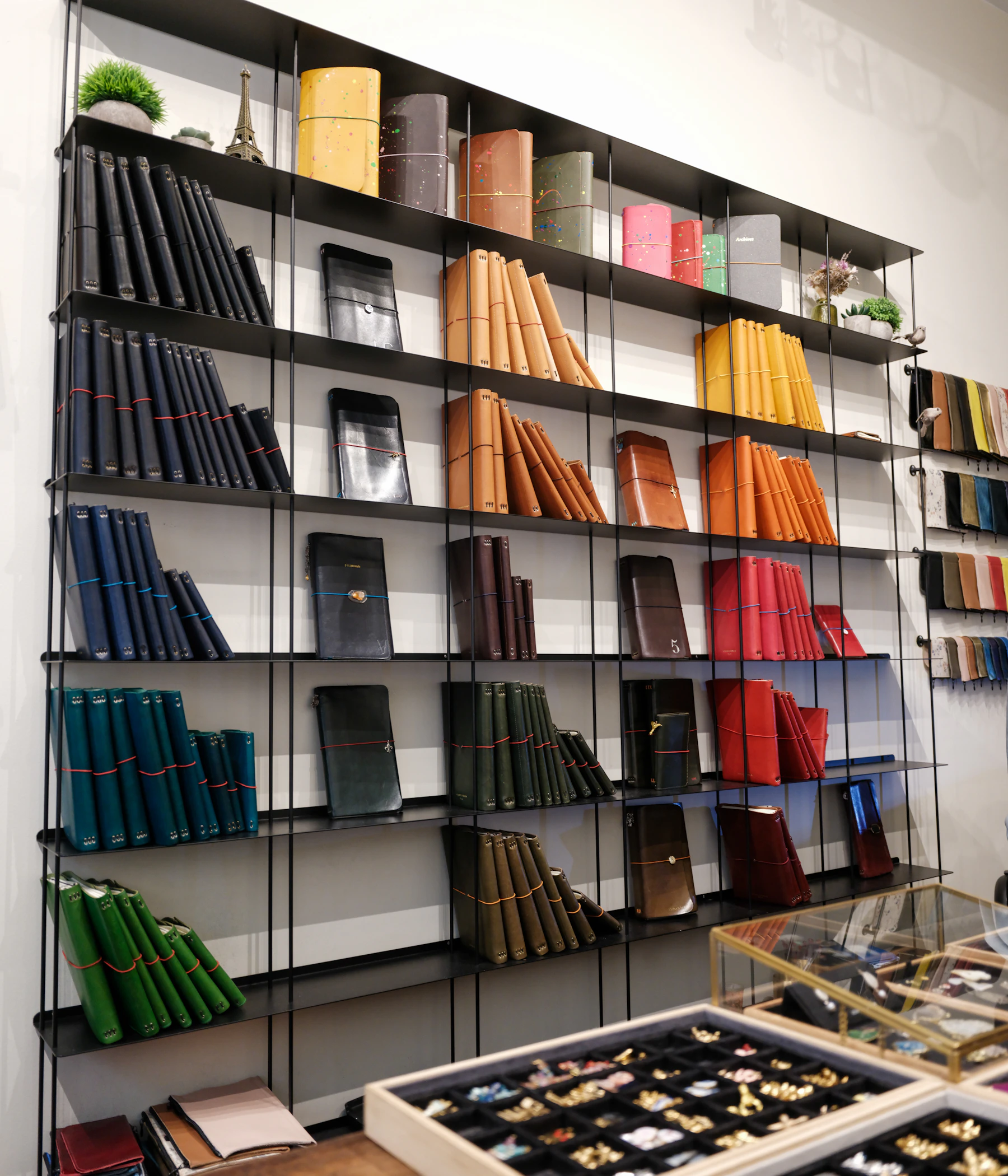 Illustrative shelves with notebooks and stationery