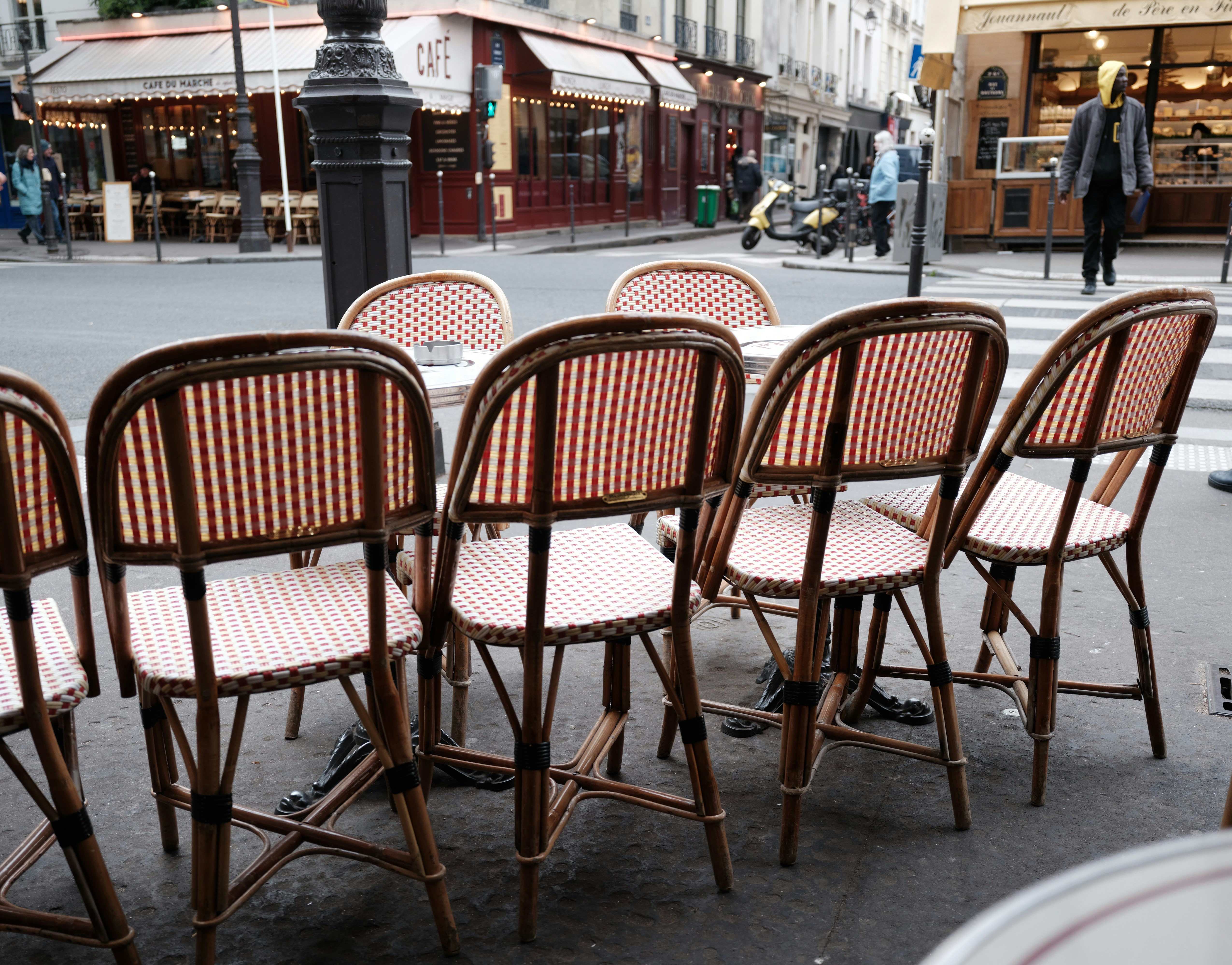 Outdoor cafe tables and chairs on a street