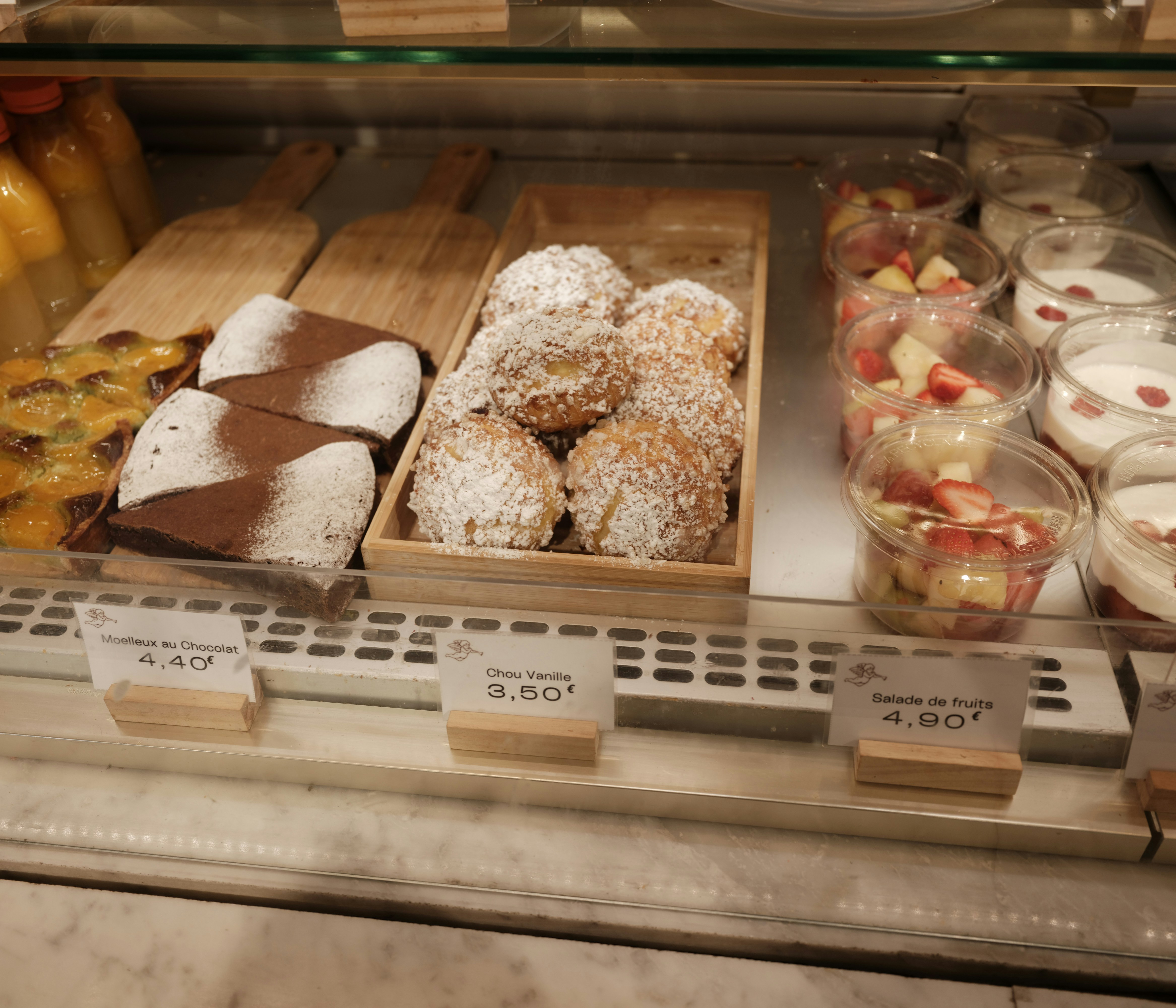 Pastries and sweets displayed in a bakery case