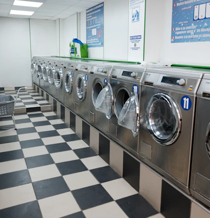 Row of washing machines in a laundromat