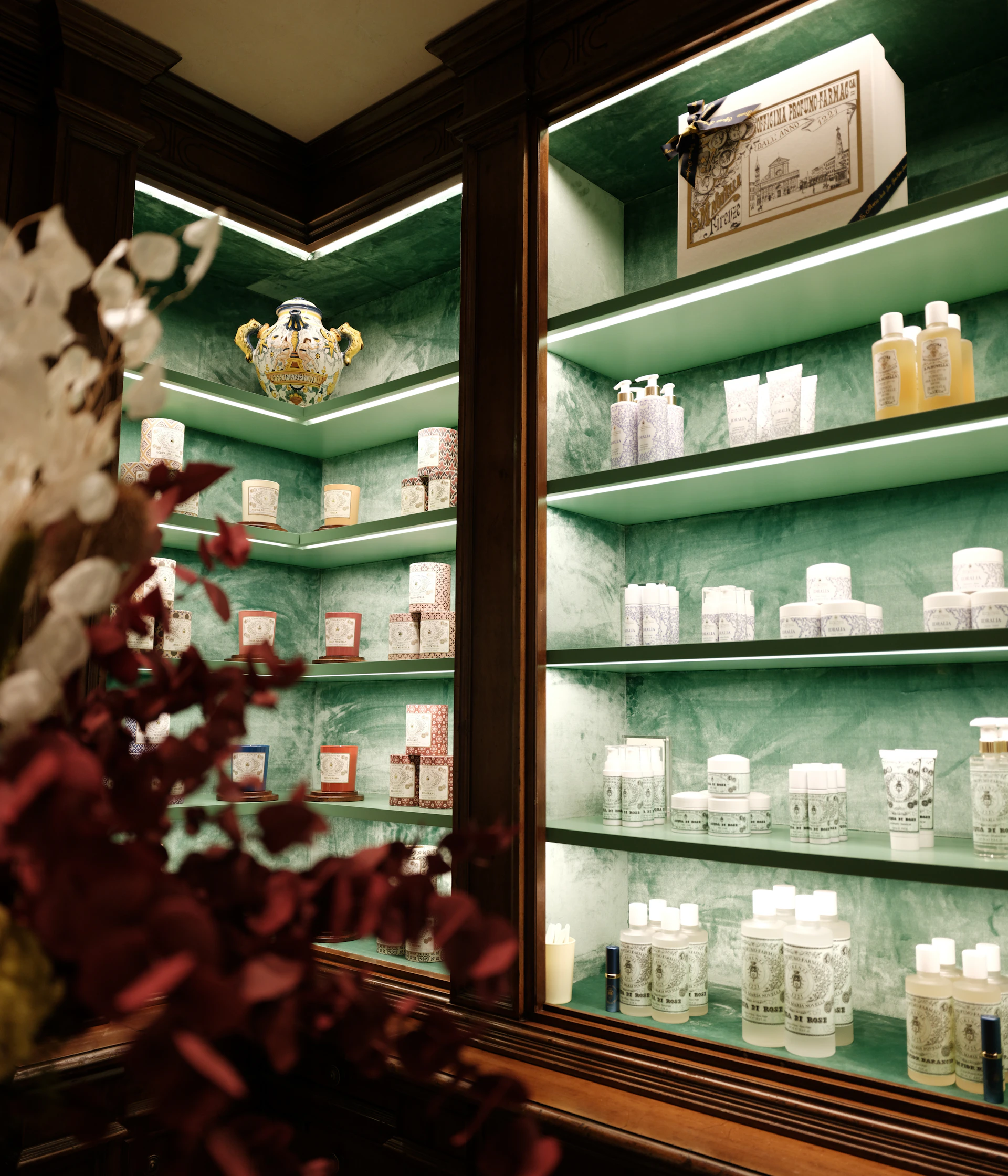 Cosmetics displayed in a well-lit cabinet.