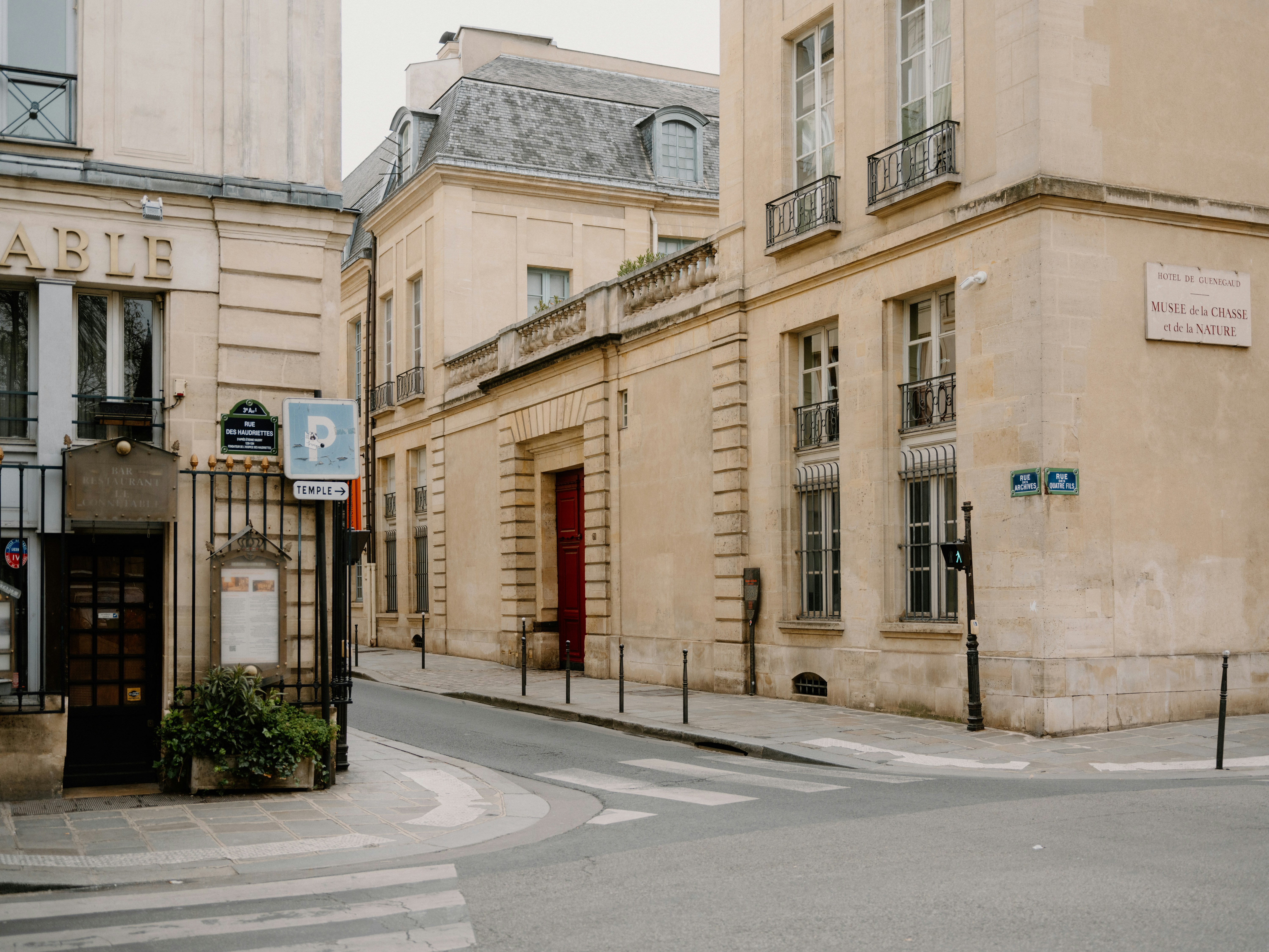Street corner with buildings and crosswalk in paris
